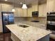 Modern kitchen with granite countertops and stainless steel appliances at 549 Balsam Fir Dr Dr, Cary, NC 27519