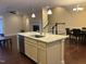 Island kitchen with granite countertops and stainless steel appliances at 549 Balsam Fir Dr Dr, Cary, NC 27519