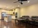 Open concept kitchen with island and stainless steel appliances at 549 Balsam Fir Dr Dr, Cary, NC 27519