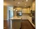 Spacious kitchen, granite island, and stainless steel appliances at 549 Balsam Fir Dr Dr, Cary, NC 27519