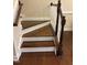Elegant staircase with dark wood and white accents at 549 Balsam Fir Dr Dr, Cary, NC 27519