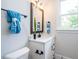 Bathroom with white vanity and modern fixtures at 64 W Beech Slope Ct, Chapel Hill, NC 27517