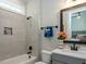 Clean bathroom with tub, shower, and modern vanity at 64 W Beech Slope Ct, Chapel Hill, NC 27517