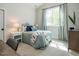 Bedroom with a queen bed and window at 64 W Beech Slope Ct, Chapel Hill, NC 27517
