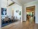 Formal dining room with a statement light fixture and hardwood floors at 64 W Beech Slope Ct, Chapel Hill, NC 27517