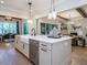Open concept kitchen with a large island and stainless steel appliances at 64 W Beech Slope Ct, Chapel Hill, NC 27517