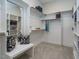 Spacious walk-in closet with built-in shelves and drawers at 64 W Beech Slope Ct, Chapel Hill, NC 27517