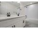 Modern bathroom with double vanity, black matte fixtures, and hexagon tile floor at 649 Mcadams Rd, Hillsborough, NC 27278