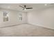 Large bedroom with ceiling fan and carpet flooring at 649 Mcadams Rd, Hillsborough, NC 27278
