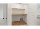 Convenient storage or laundry area with shelves at 649 Mcadams Rd, Hillsborough, NC 27278