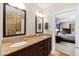 Elegant bathroom with granite countertops and double sinks at 715 Powell Dr, Raleigh, NC 27606