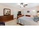 Spacious bedroom with hardwood floors and ample closet space at 715 Powell Dr, Raleigh, NC 27606