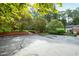 Spacious driveway with brick accents and ample parking at 715 Powell Dr, Raleigh, NC 27606