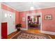 Entryway with hardwood floors, a chandelier, and view of dining room at 715 Powell Dr, Raleigh, NC 27606