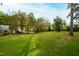 Expansive lawn with mature trees and privacy at 715 Powell Dr, Raleigh, NC 27606