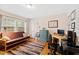 Home office with hardwood floors and built-in workspace at 715 Powell Dr, Raleigh, NC 27606