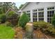 Charming water feature with a large stone vase at 715 Powell Dr, Raleigh, NC 27606