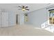 Light and airy bedroom with plush carpet, a ceiling fan, and a window at 8005 Sundance Cir, Durham, NC 27713