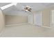 Large bedroom featuring ceiling fan and multiple closets for storage at 8005 Sundance Cir, Durham, NC 27713