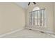 Bedroom with neutral carpet, neutral paint, ceiling fan, and a window for plenty of light at 8005 Sundance Cir, Durham, NC 27713