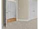 Bedroom features neutral paint and carpet, with two closets and an ensuite bathroom at 8005 Sundance Cir, Durham, NC 27713