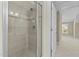 Tiled shower with glass door at 8005 Sundance Cir, Durham, NC 27713