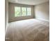 Bright and airy bonus room with three windows and neutral carpeting at 962 Double Helix Rd, Apex, NC 27523