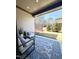Relaxing covered patio with outdoor furniture and a view of the backyard at 962 Double Helix Rd, Apex, NC 27523