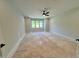 Bedroom with a ceiling fan and large window at 1031 Coldspring Circle, Durham, NC 27705