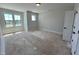 Bright bedroom with multiple windows and neutral paint, ready for your personal touch at 1031 Coldspring Circle, Durham, NC 27705