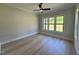 Bedroom featuring neutral walls, vinyl flooring and a ceiling fan at 1031 Coldspring Circle, Durham, NC 27705