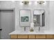 Modern bathroom with double vanity and large mirrors at 113 Laurston Ct, Durham, NC 27712