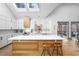 Bright kitchen features a large island and stainless steel appliances at 113 Laurston Ct, Durham, NC 27712