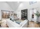 Living room with hardwood floors, fireplace, and access to deck at 113 Laurston Ct, Durham, NC 27712