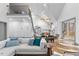 Open concept living space with sectional sofa, dining area and kitchen at 113 Laurston Ct, Durham, NC 27712