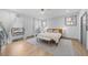 Spacious main bedroom with hardwood floors and large windows at 113 Laurston Ct, Durham, NC 27712