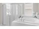 A bathroom with a standalone shower and soaking tub at 129 Mossy Falls Way, Wendell, NC 27591