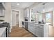 Well-equipped kitchen features stainless steel appliances and eat in bar at 129 Mossy Falls Way, Wendell, NC 27591