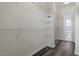 Spacious walk-in closet offers ample storage with multiple shelves and access to an en-suite bathroom at 133 John Winstead Rd, Louisburg, NC 27549