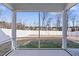 This back porch offers a secluded outdoor space with views of the expansive backyard at 137 Alderbranch Cir, Garner, NC 27529