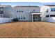 Large backyard features privacy fence and a covered screened in back porch at 137 Alderbranch Cir, Garner, NC 27529
