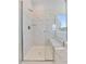 This modern bathroom features a luxurious shower with elegant marble tile and a built-in bench at 137 Alderbranch Cir, Garner, NC 27529