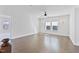 Spacious, brightly lit bedroom with hardwood floors, a ceiling fan, and double windows at 137 Alderbranch Cir, Garner, NC 27529