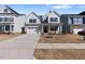Charming two-story home with a two-car garage and a well manicured lawn at 137 Alderbranch Cir, Garner, NC 27529