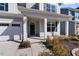 Inviting front porch with white columns, landscaping, and the house number prominently displayed at 137 Alderbranch Cir, Garner, NC 27529