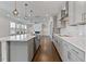 Bright kitchen with stainless steel appliances, granite countertops, and an island at 137 Alderbranch Cir, Garner, NC 27529
