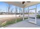 View from screened-in porch of expansive backyard with privacy fence and mature trees at 137 Alderbranch Cir, Garner, NC 27529