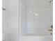 Simple white shower tub combo with stainless steel fixtures at 137 Alderbranch Cir, Garner, NC 27529
