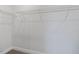 Empty walk-in closet with wire shelving ready for storage at 137 Alderbranch Cir, Garner, NC 27529