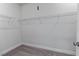 Walk-in closet with built-in wire shelving for organized storage solutions at 137 Alderbranch Cir, Garner, NC 27529